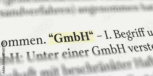 GmbH im Buch mit Textmarker markiert photo