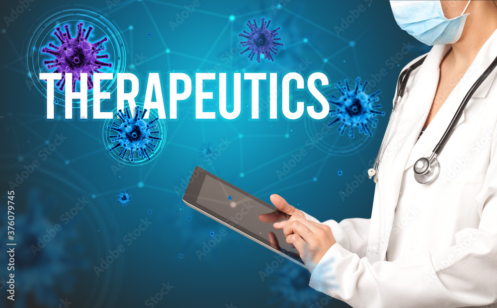 doctor prescribes a prescription with THERAPEUTICS inscription, pandemic concept doctor prescribes a prescription with THERAPEUTICS inscription, pandemic concept