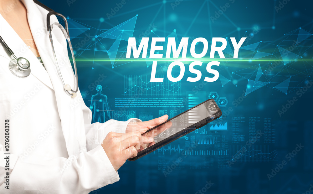doctor writes notes on the clipboard with MEMORY LOSS inscription, medical diagnosis concept doctor writes notes on the clipboard with MEMORY LOSS inscription, medical diagnosis concept