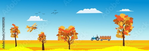 Horozontal banner Autumn landscape countryside with hills, trees and fall leaves, blue sky clouded