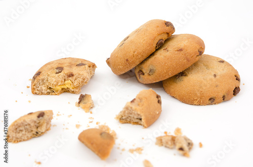 delicious cookies with pieces of cookies and crumbs isolated on a white background.