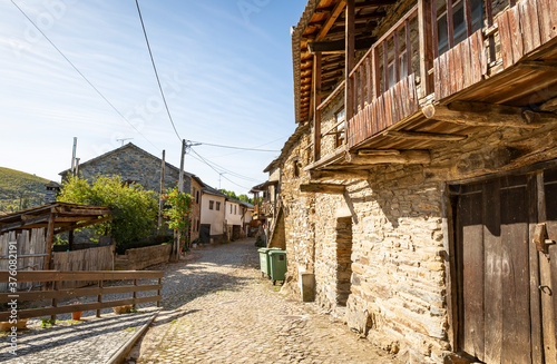 a street with typical old houses in Rio de Onor village, municipality of Braganca, Tras-os-Montes, Portugal © Jorge Anastacio