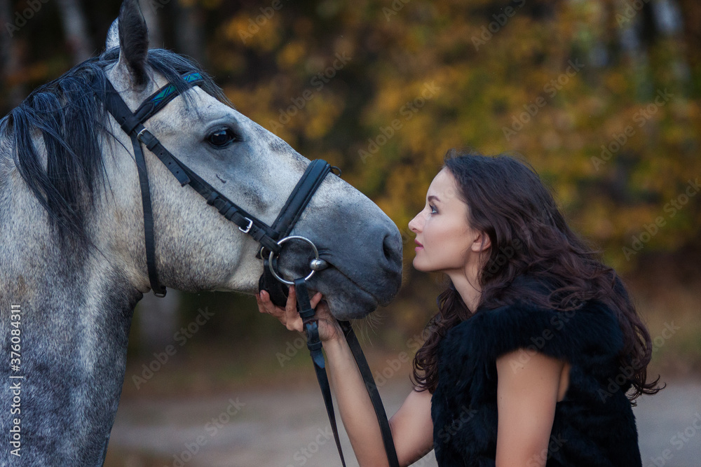 Obraz premium Girl and horse