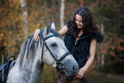 Girl and horse © Michael Kutepov