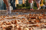 Autumn colorful leaves on the sidewalk during leaf fall