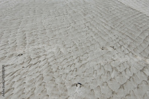 White sand texture. Sand mining background.