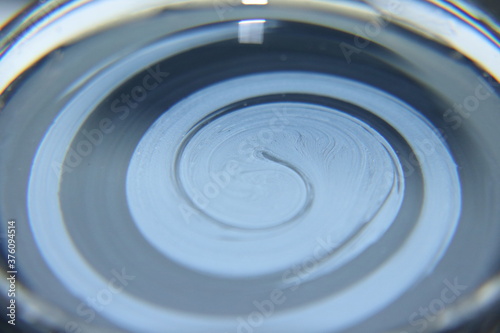 Spiral pattern formed by paint on water