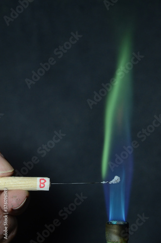 Colored fire caused by an element. Boron causes a green flame color.