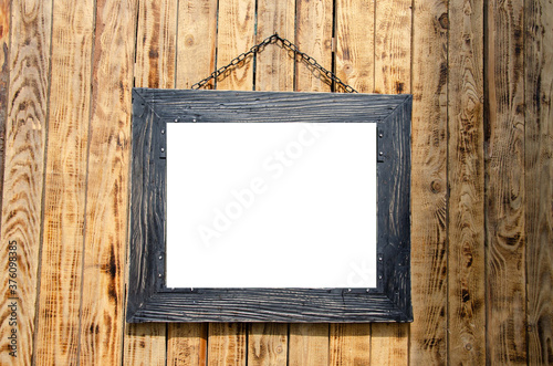 Brown wooden frame with white free lettering background.