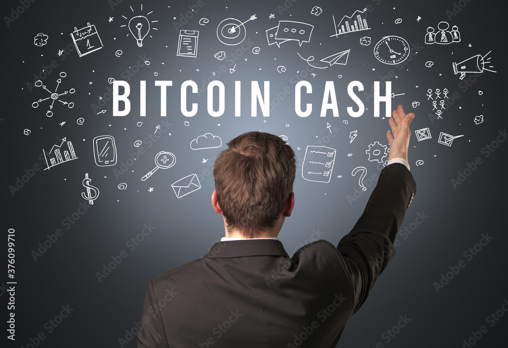 Rear view of a businessman with BITCOIN CASH inscription, modern business concept