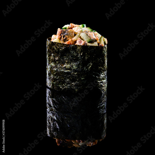 gunkan sushi on a black background. menu photo