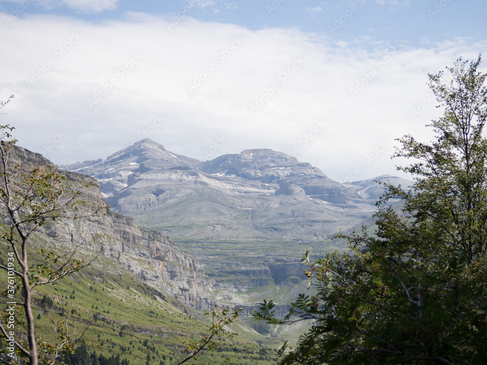 Ordesa Valley in the Pyrenees with mountains in the background. Ordesa Valley in the Pyrenees with mountains in the background.