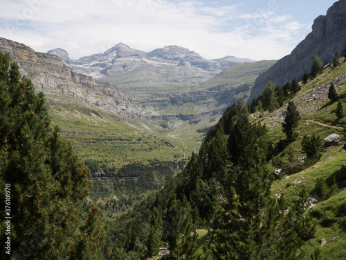 Ordesa Valley in the Pyrenees with mountains in the background.