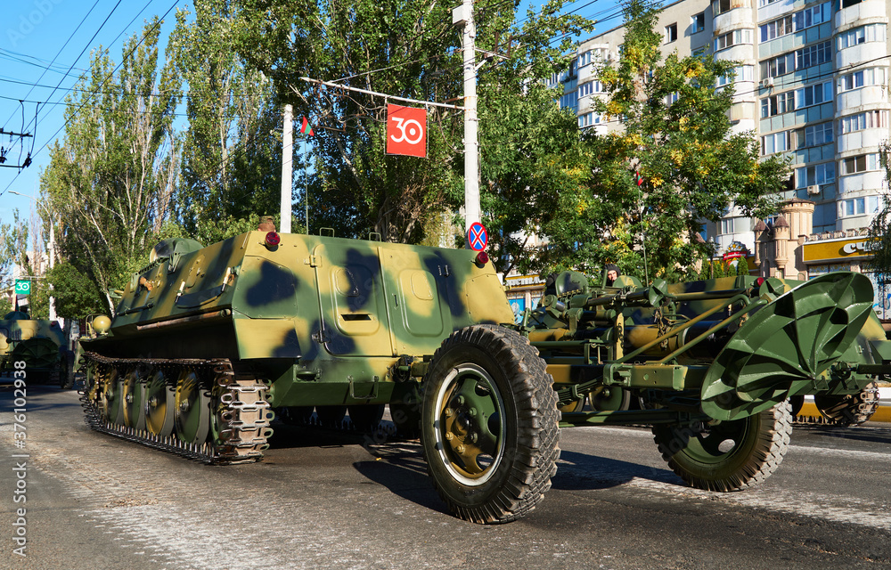 military parade in the city, ordered military equipment, tanks, guns and other weapons in the street for celebration military parade in the city, ordered military equipment, tanks, guns and other weapons in the street for celebration