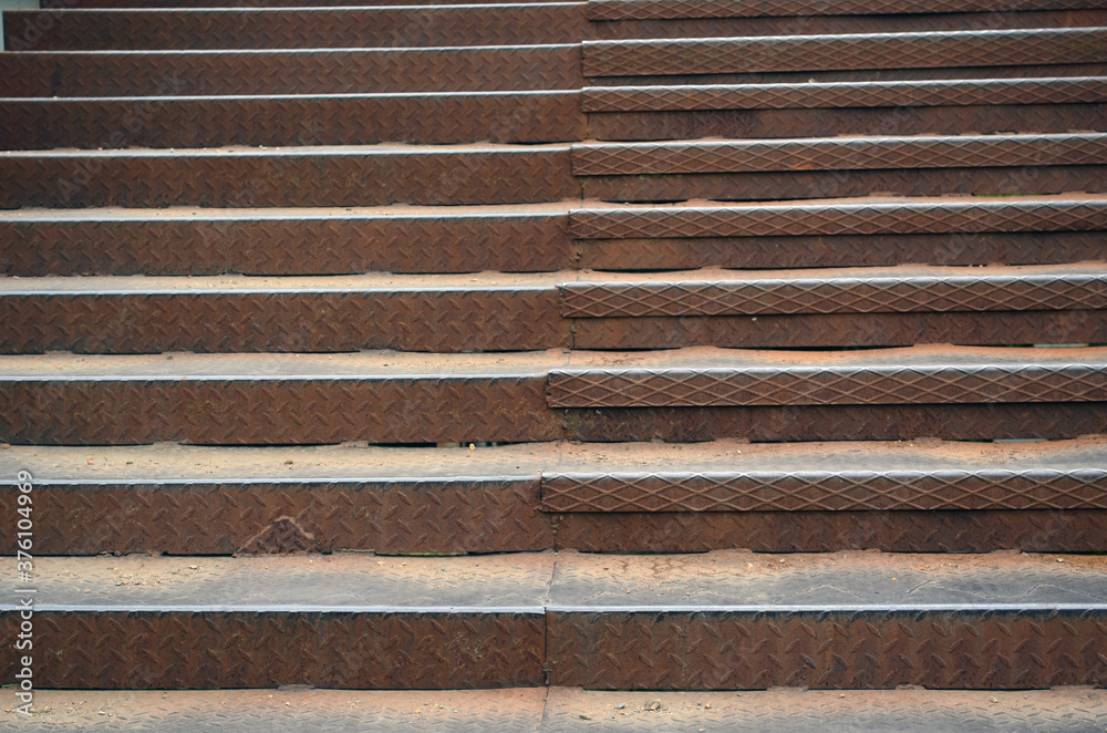 Iron staircase upstairs. Old building.