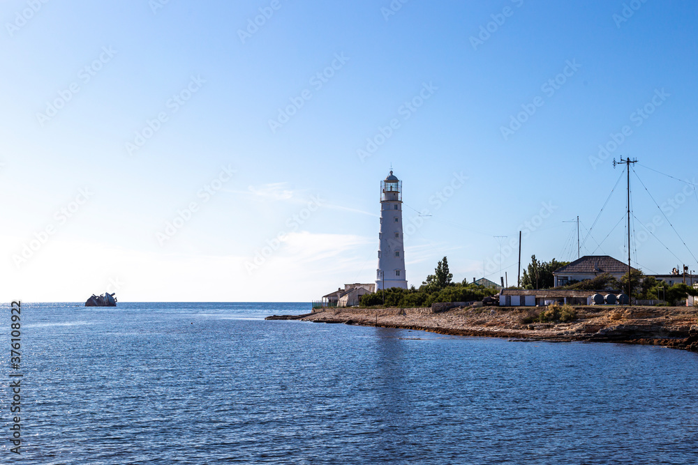 Lighthouse at Cape Tarkhankut on a bright sunny day. Republic of Crimea.