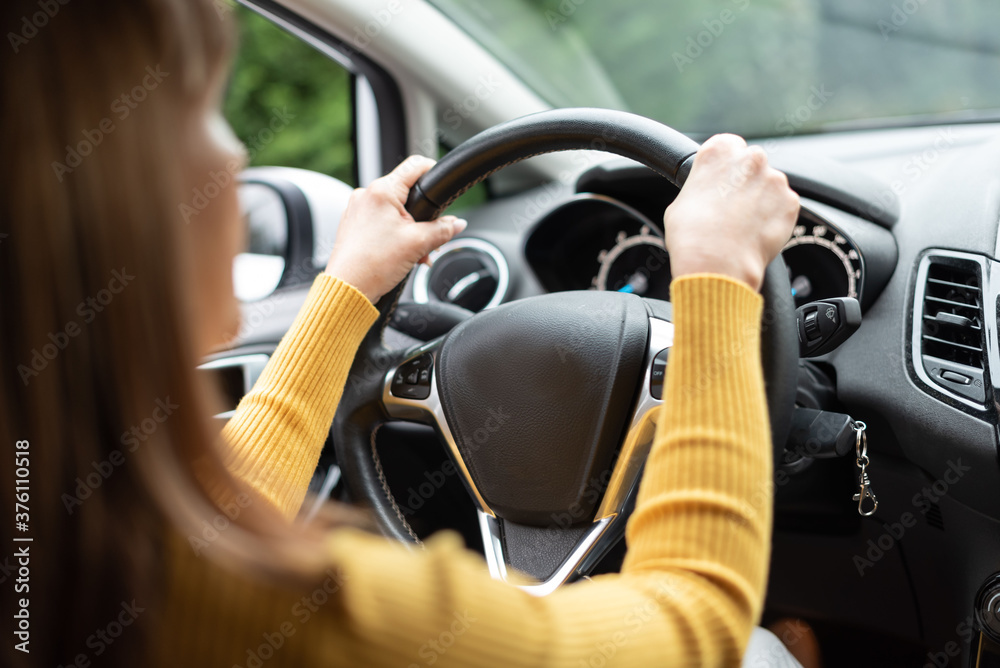 Woman driving carrefully