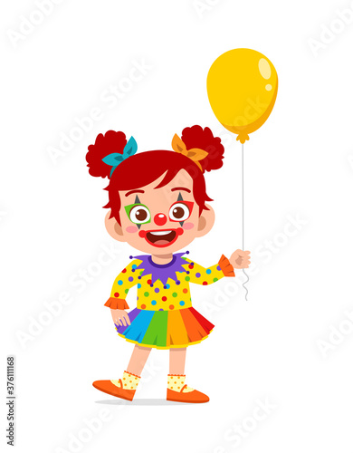 happy cute little kid boy and girl celebrate halloween wears clown costume