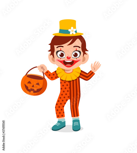 happy cute little kid boy and girl celebrate halloween wears clown costume