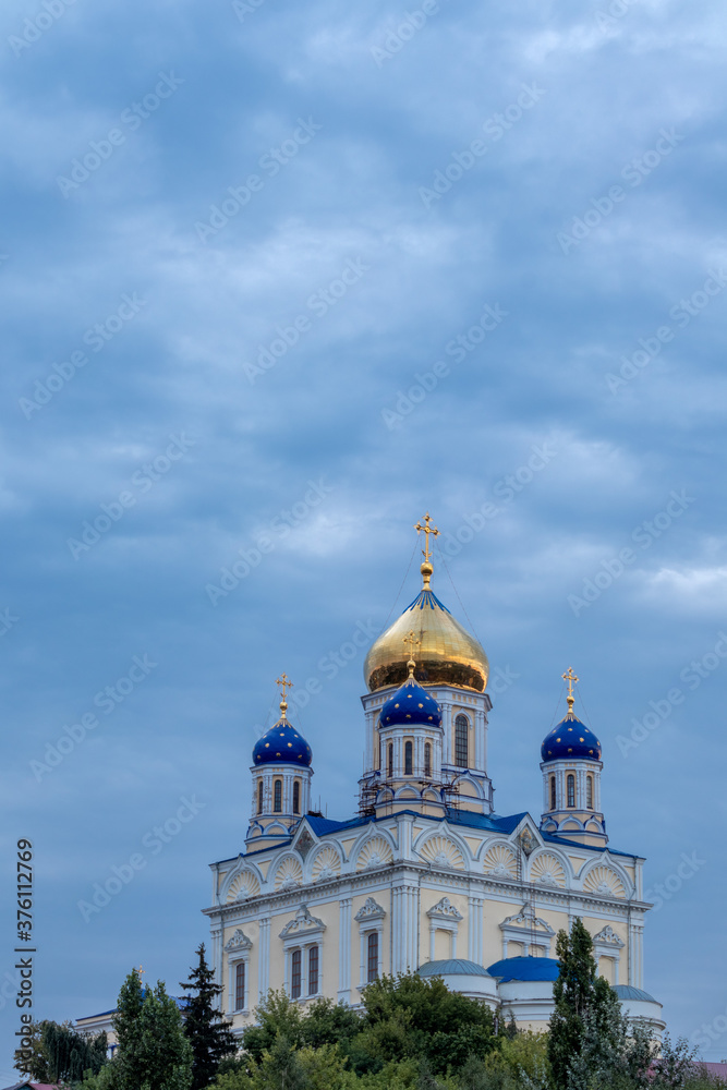 Russia, the city of Yelets, view of the Cathedral of the ascension of the Lord under a cloudy sunset sky.
