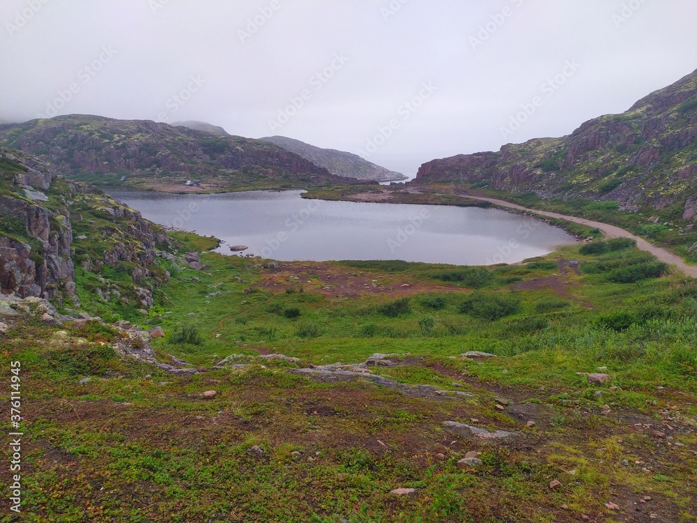 Lake in the mountains on the shore of the Barents sea