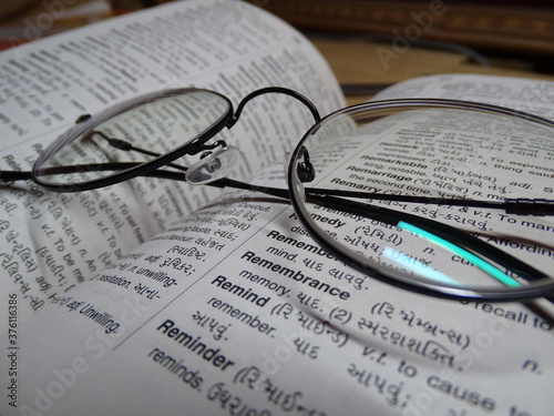 dictionary and glasses