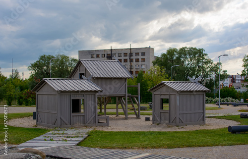 Little wooden houses at children playground at Pasta Island in Jelgava, Latvia.