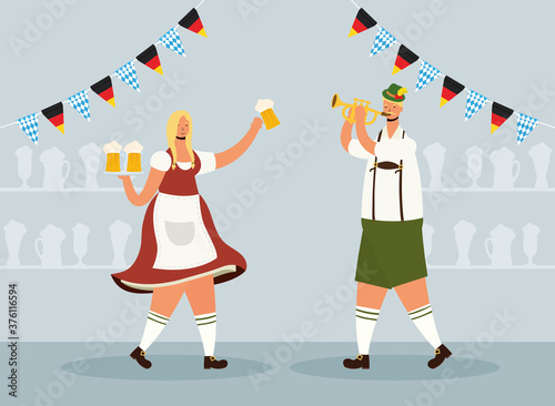 german couple wearing tyrolean suit drinking beers and playing trumpet