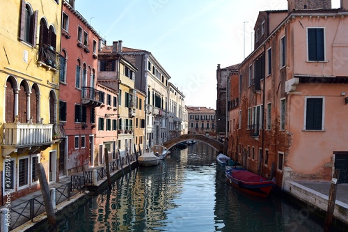 venice canal with gondola and bridge no people travel destinations © Miruna
