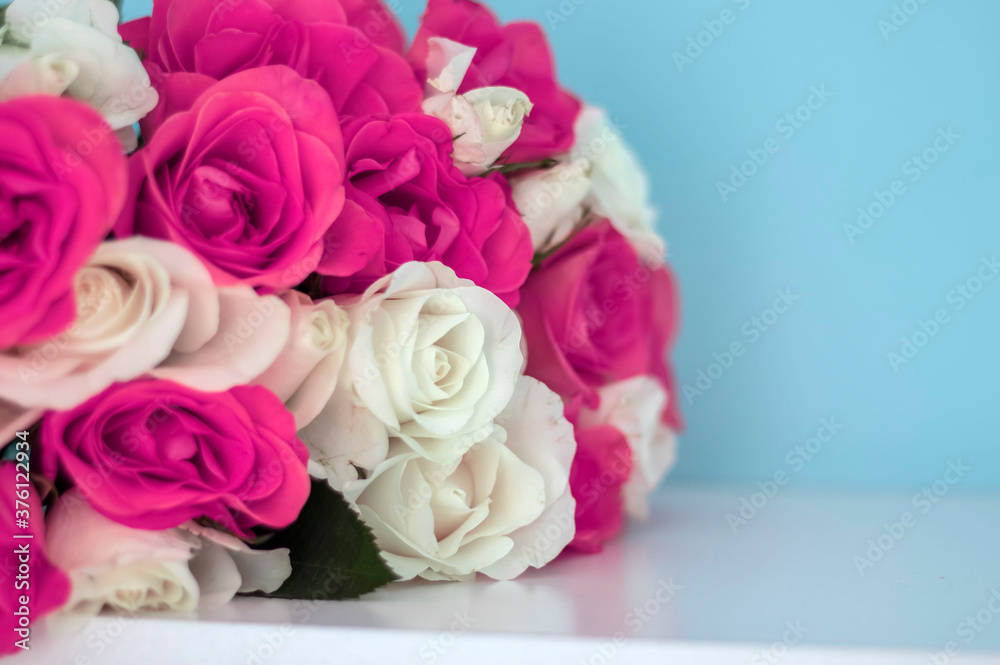 Beautiful bouquet of roses with gifts and cafe.On a white background a beautiful bouquet of colorful roses.
Beautiful bouquet of roses with gifts and cafe.On a white background a beautiful bouquet of colorful roses.