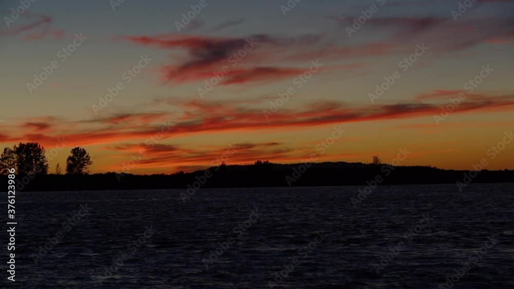 Summer Sunset over Jetty Island, Port Gardner Bay, Everett Washington. Summer Sunset over Jetty Island, Port Gardner Bay, Everett Washington.