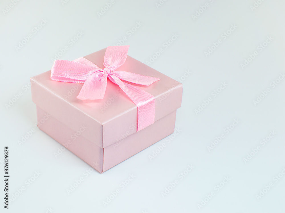 Pink Gift Wrapped Present With Rosy Satin Ribbon Bow Stock Photo - Download  Image Now - iStock