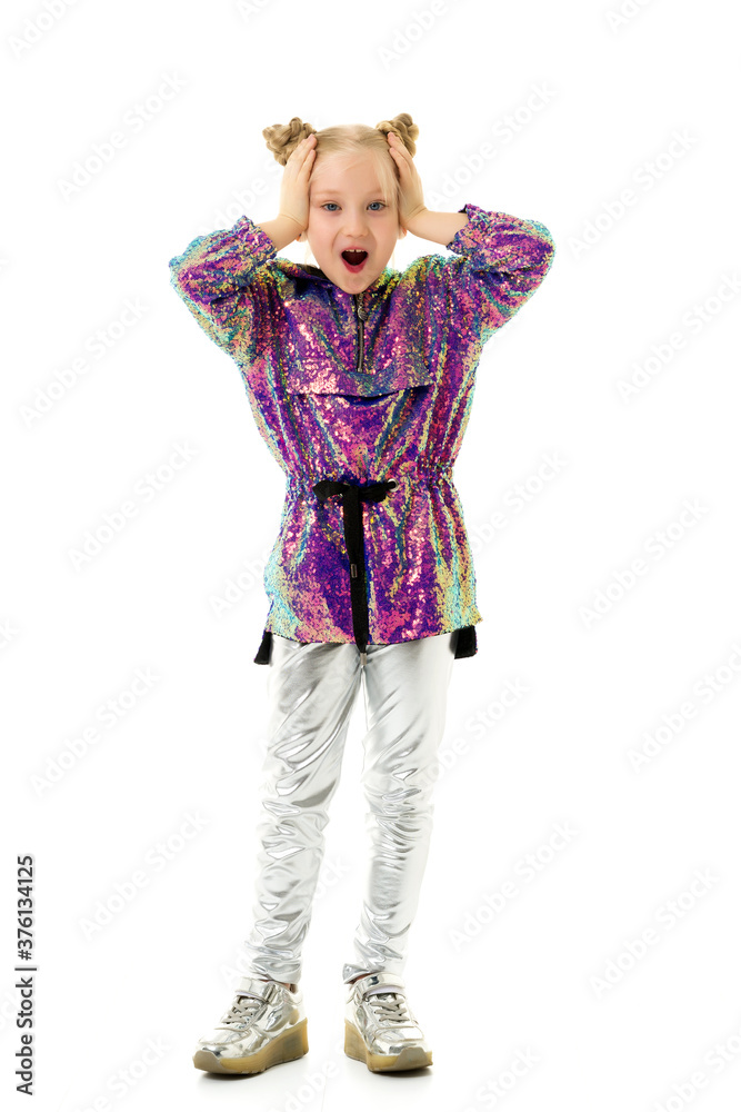 The little girl opened her mouth in surprise.Isolated over white The little girl opened her mouth in surprise.Isolated over white