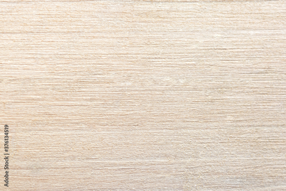 Texture of white painted wood. Abstract wooden light background. Pale yellow shade of natural paint. Macrophotography of wood texture and veins. The style of Provence. Texture of white painted wood. Abstract wooden light background. Pale yellow shade of natural paint. Macrophotography of wood texture and veins. The style of Provence.