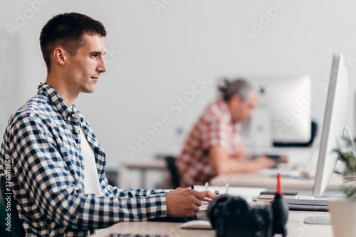 Business people working together at the office photo