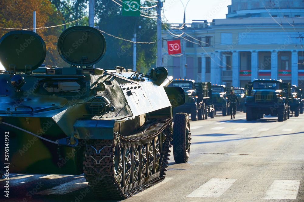 Fototapeta premium military parade in the city, ordered military equipment, tanks, guns and other weapons in the street for celebration