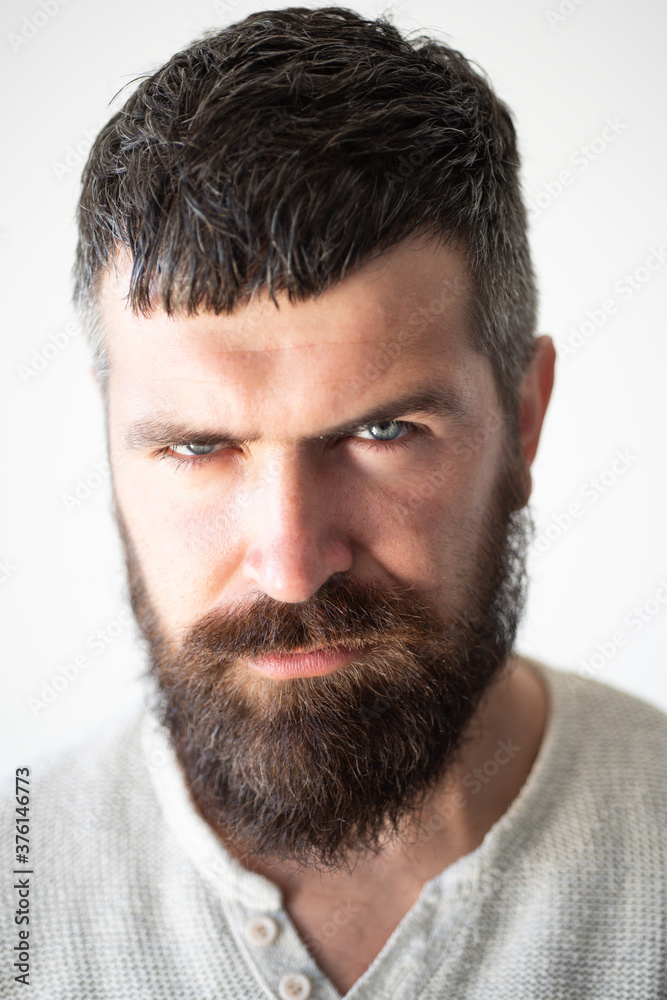 Portrait of confident serious man, looks seriously, isolated. Hipster guy models in studio. Businessman thinking with expression looking. Handsome male model, closeup face. Portrait of confident serious man, looks seriously, isolated. Hipster guy models in studio. Businessman thinking with expression looking. Handsome male model, closeup face.