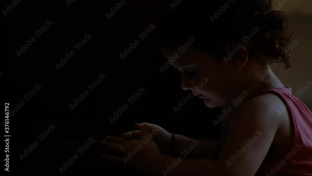 Cute baby girl playing with her smartphone in the house. Babies and technology Cute baby girl playing with her smartphone in the house. Babies and technology