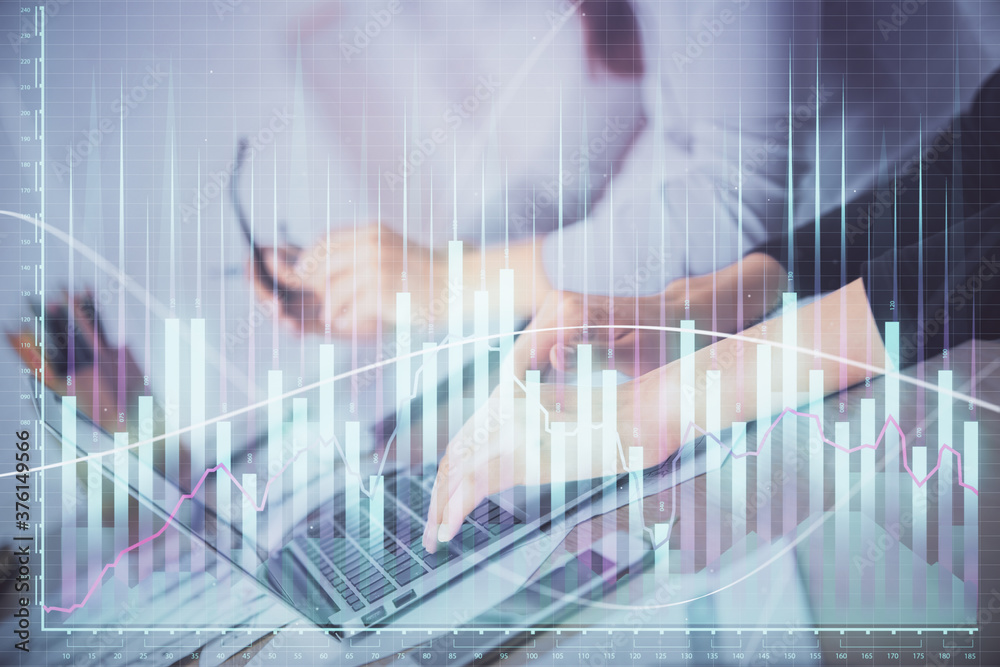 Multi exposure of woman hands typing on computer and financial chart hologram drawing. Stock market analysis concept. Multi exposure of woman hands typing on computer and financial chart hologram drawing. Stock market analysis concept.