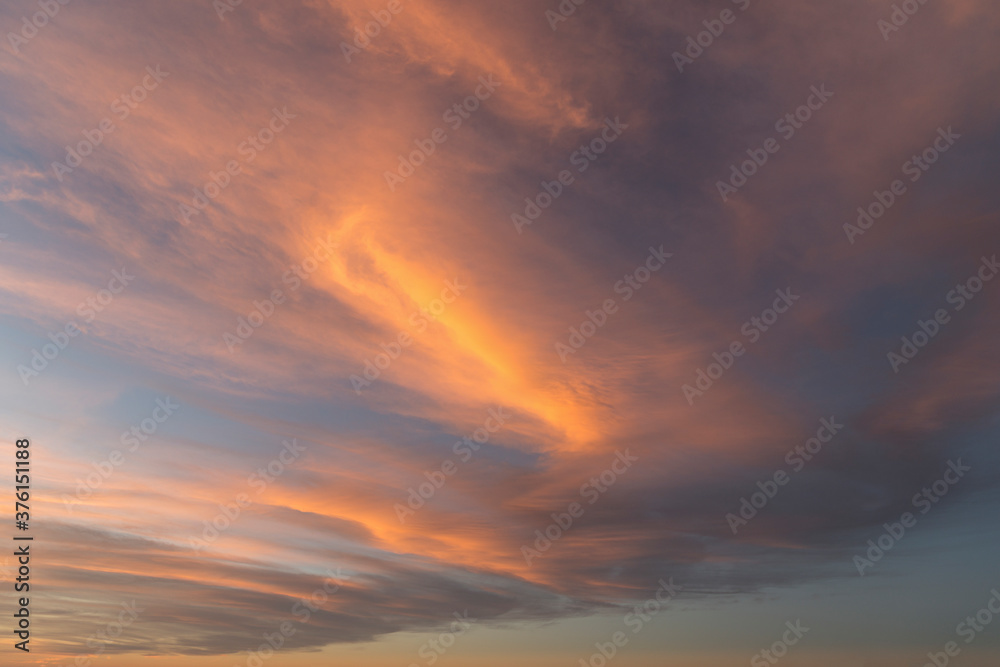Sunrise creating beautyful coloured clouds, repacement sky, background.