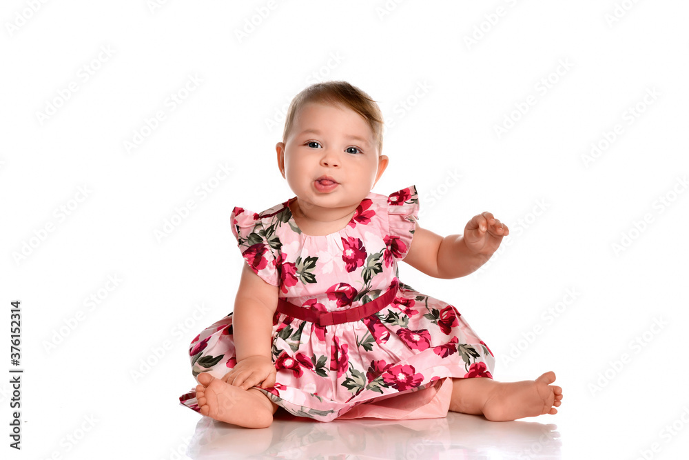 Portrait of a sweet infant girl isolated on white in studio. Portrait of a sweet infant girl isolated on white in studio.