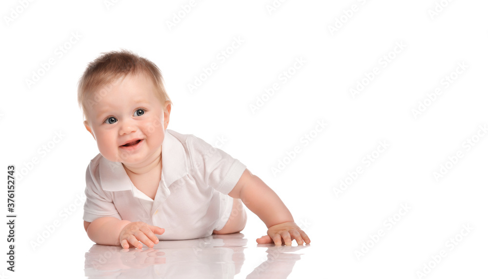 Close up portrait of an amazing toddler boy in a white polo on a white background. Close up portrait of an amazing toddler boy in a white polo on a white background.