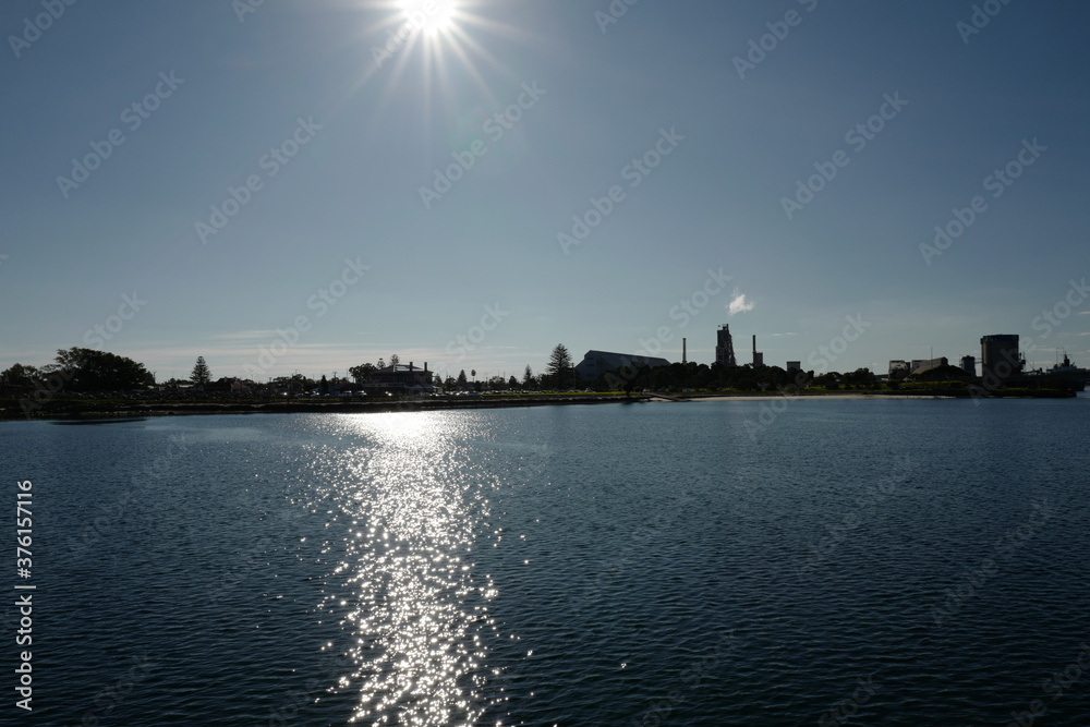 Naklejka premium sunset over the river