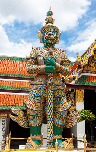 Demon Guardian in Temple of the Emerald Buddha (Wat Phra Kaew) Bangkok Thailand Traditional religious architecture of Asia Tourist destination
