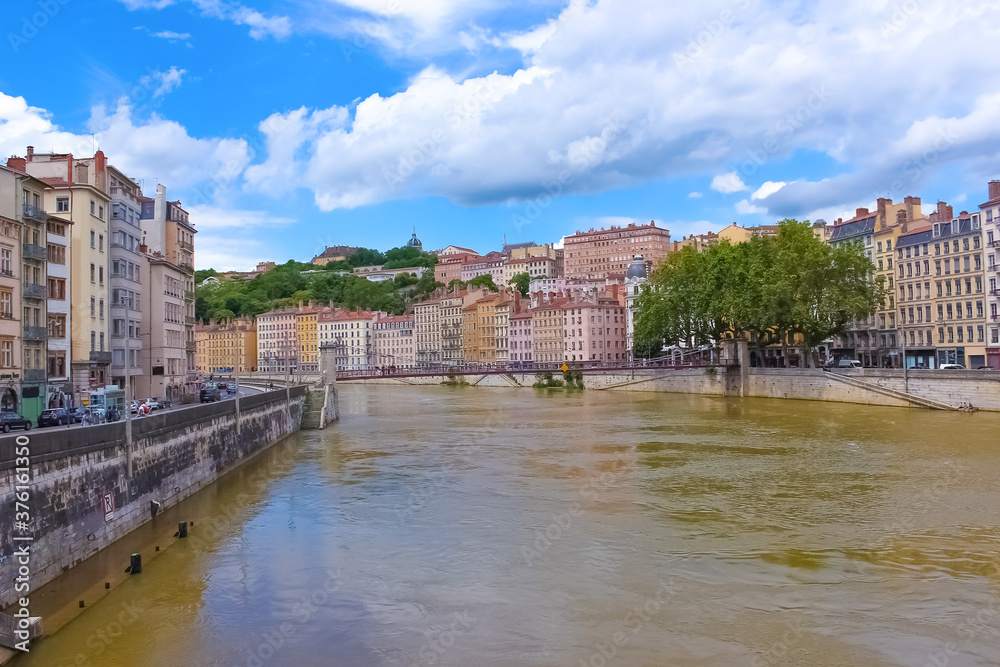 Lion, France - June 16, 2716: View from river Sona to the bridge and Lyon city,