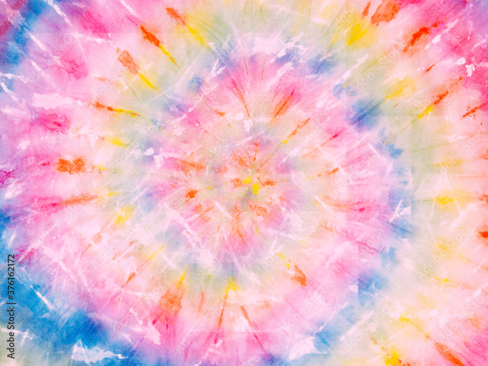 Spiral tie dye pattern backdrop. Tie-dye background wallpaper. Hippie