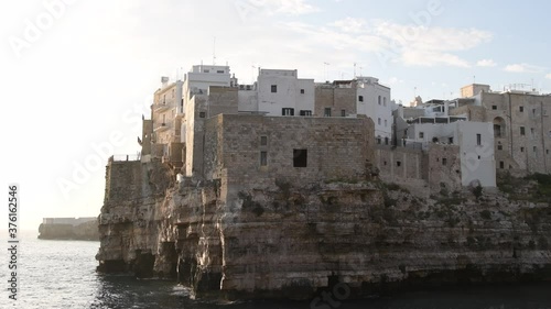 Video of the sunrise of Polignano a mare, Puglia, Italy. Cliff overlooking the sea photo