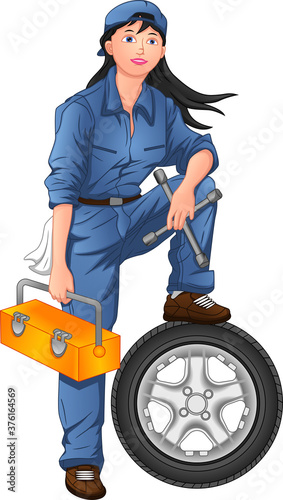 woman mechanic posing with tires and tool box