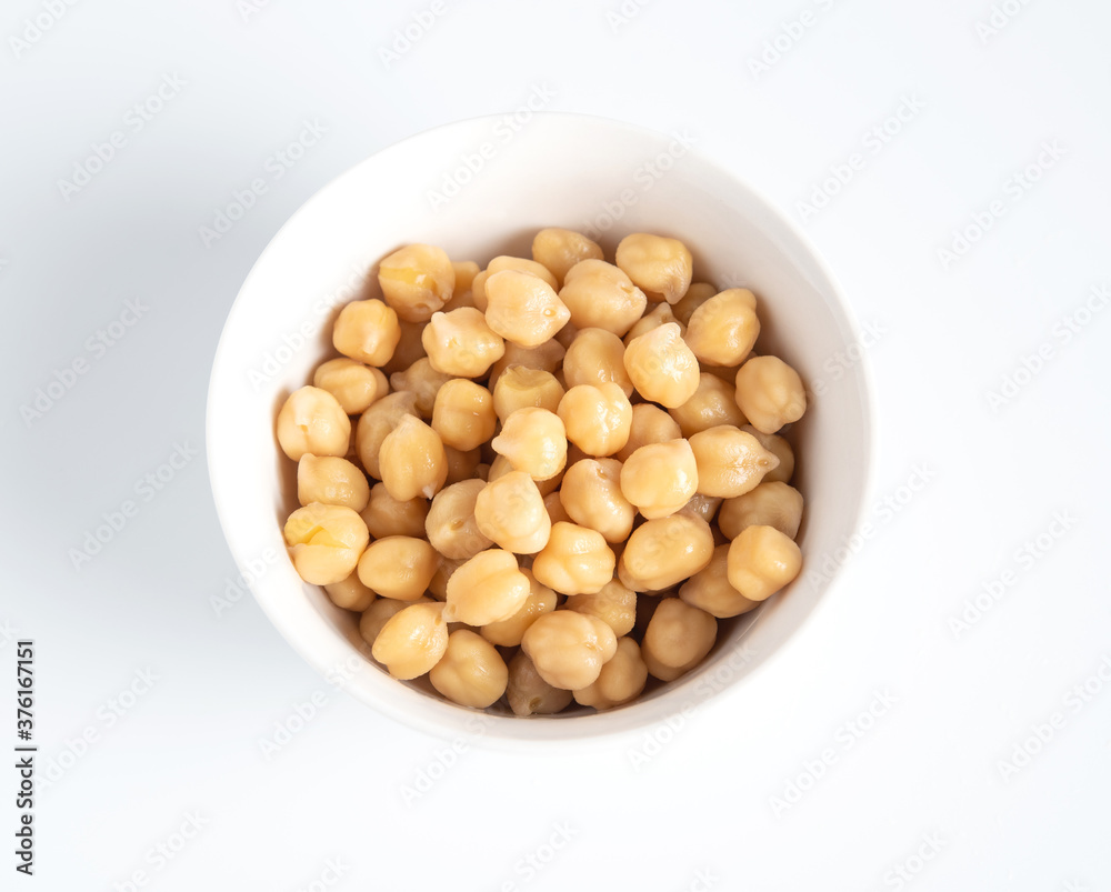 Top view of cooked chickpeas in white bowl. Healthy food concept Top view of cooked chickpeas in white bowl. Healthy food concept