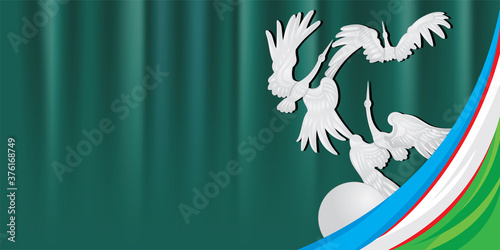 Storks over the globe and the flag of Uzbekistan on Independence square